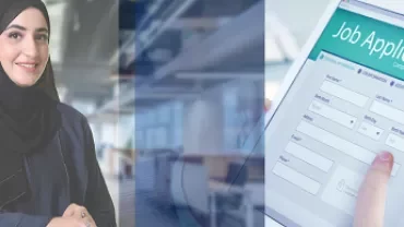 Smiling woman in hijab next to a tablet with a job application form.