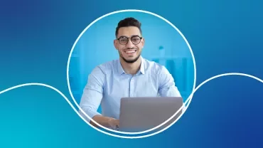 a man in an office attire with a laptop.