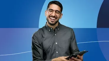 Promotional banner for Salary Guides 2026 featuring a smiling man on a blue background