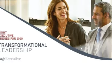 Two professionals discussing transformational leadership trends for 2020.