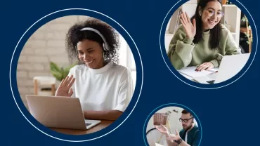 Three people in a virtual meeting, smiling and waving at their laptops.