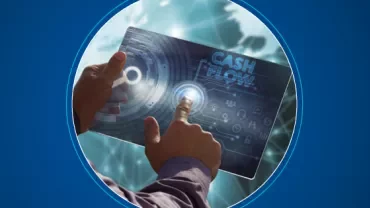 Person using a digital tablet with cash flow data on a blue background.