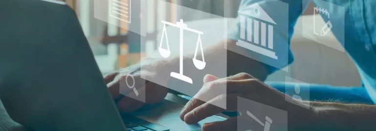 Person typing on a laptop with digital justice icons overlayed.