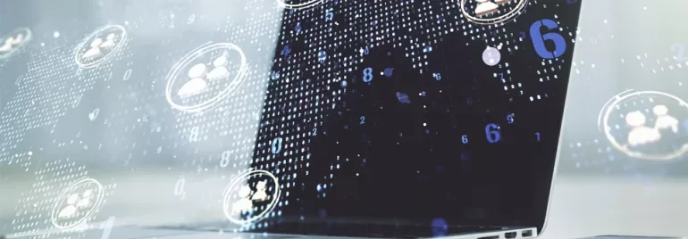Digital data and user icons overlaid on a laptop screen.