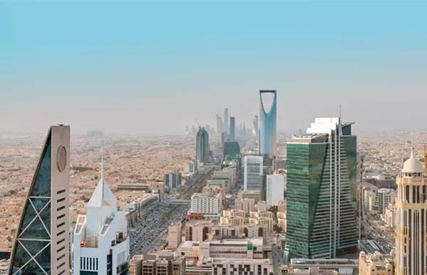 Skyline of Riyadh, showcasing modern skyscrapers under a clear blue sky.