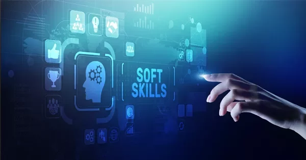 Hand reaching towards digital icons and 'Soft Skills' text on a virtual interface.
